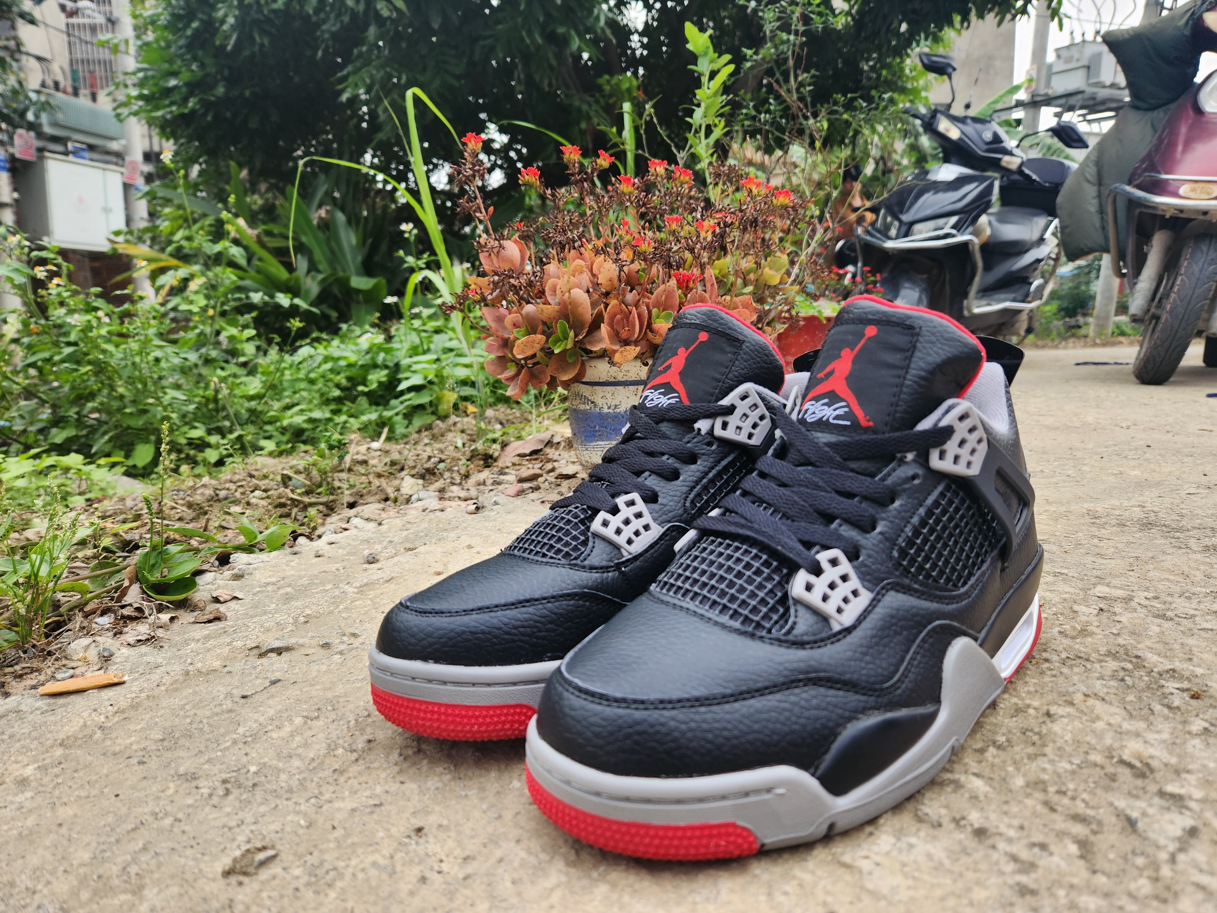 Air Jordan 4 Black/Red Leather | Unisex