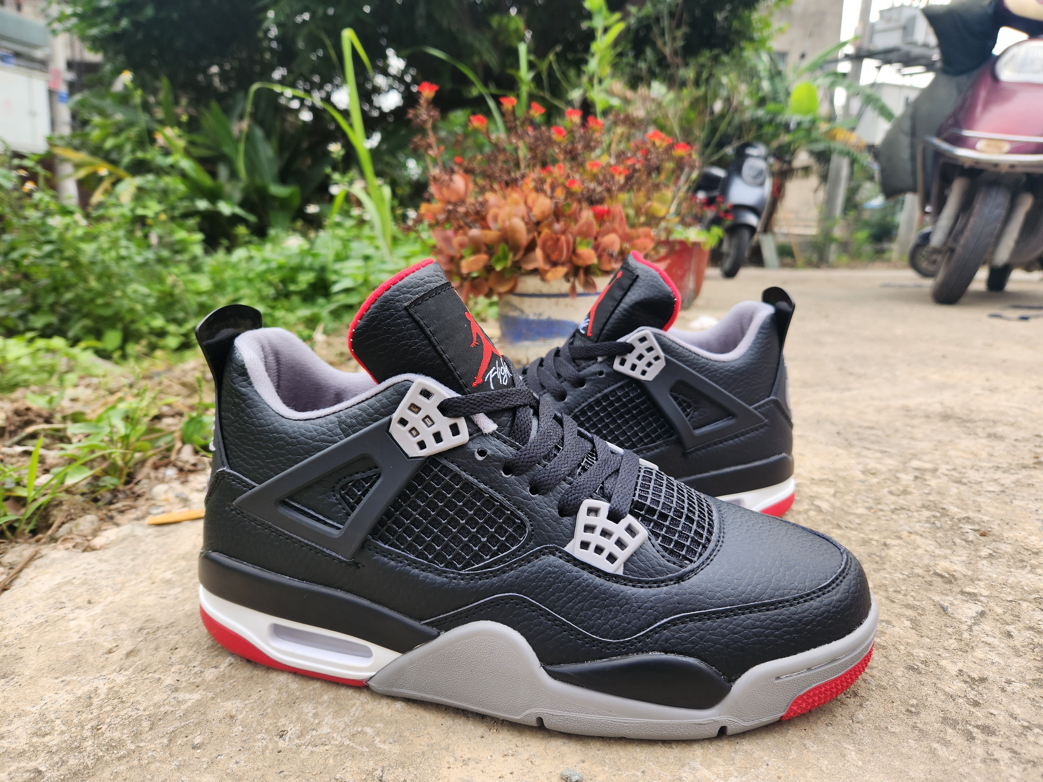 Air Jordan 4 Black/Red Leather | Unisex